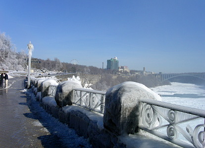 [Icicles hanging from railing metalwork.]